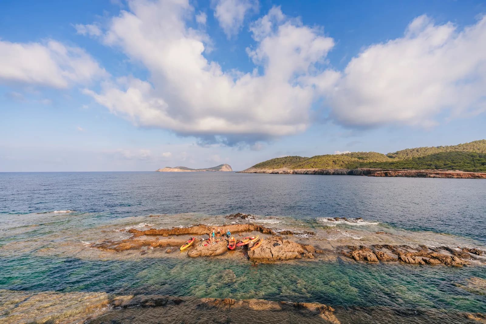 Ibiza's wild northeast coastline from the water
